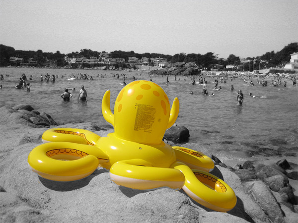 And odd inflatable beach toy in yellow