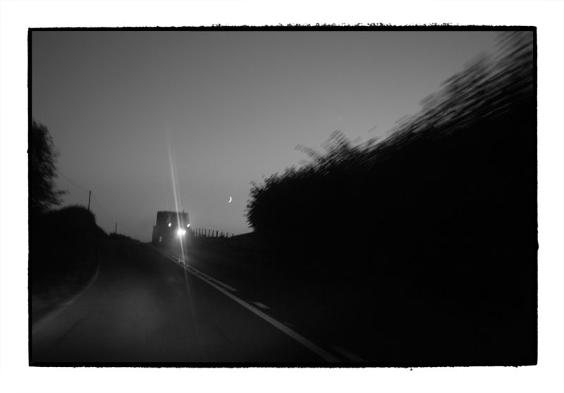 Tractor, Moon, night road past Bronydd, Radnorshire. October 2010. Lumix GF1, 20mm f1.8.