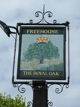 a pub sign that reads 'the royal oak'